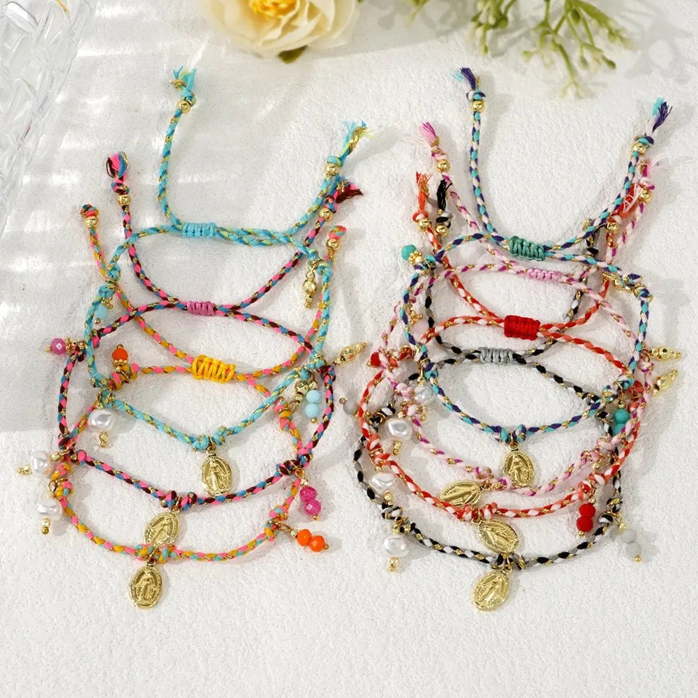 Close-up of a hand-woven colourful braided rope bracelet with an adjustable strap tag closure.