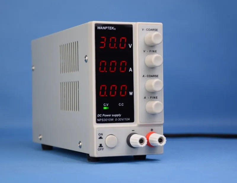 White S605W adjustable laboratory DC power supply with voltage and current control dials.