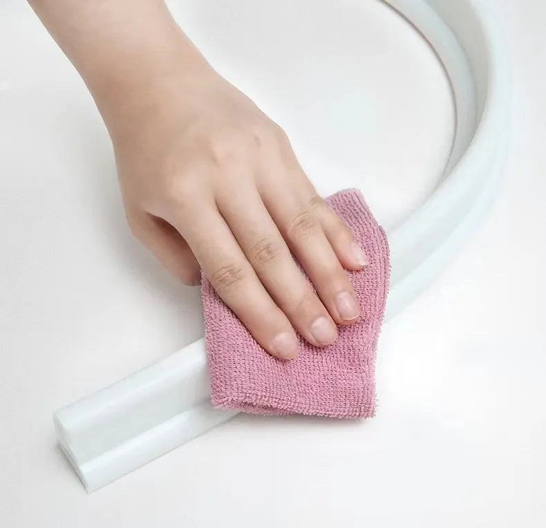 Flexible silicone bathroom water blocking strip in black, white, and grey colour options