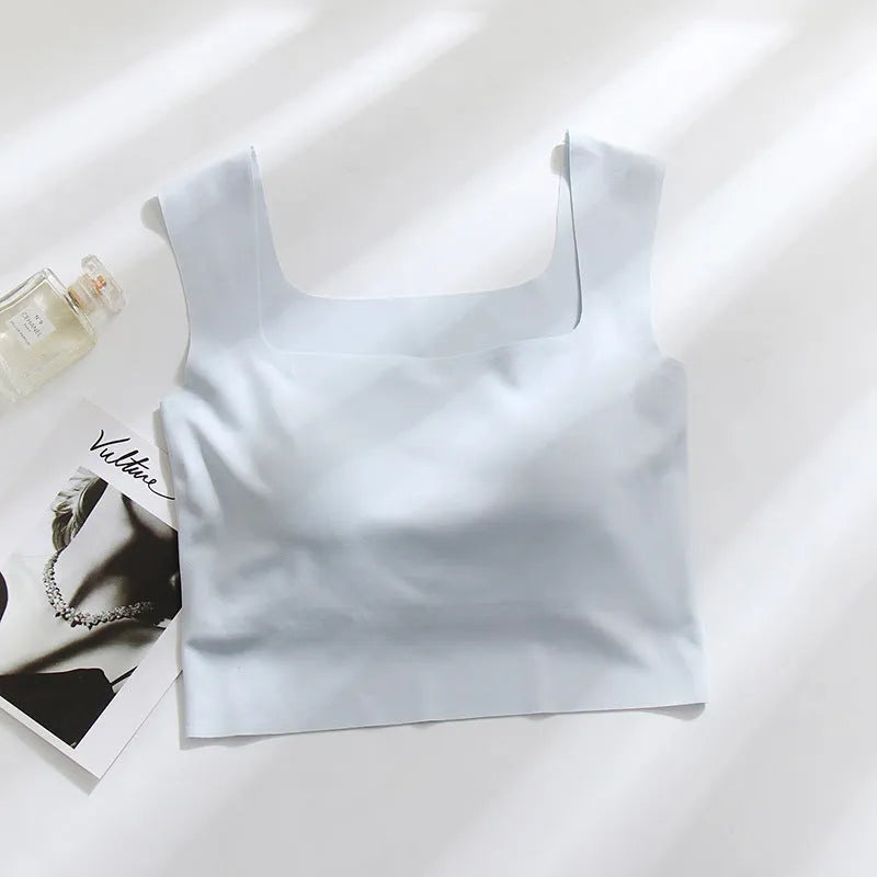 Women's non-marking fixing cup sling vest with chest pad in nylon, shown in light blue colour.