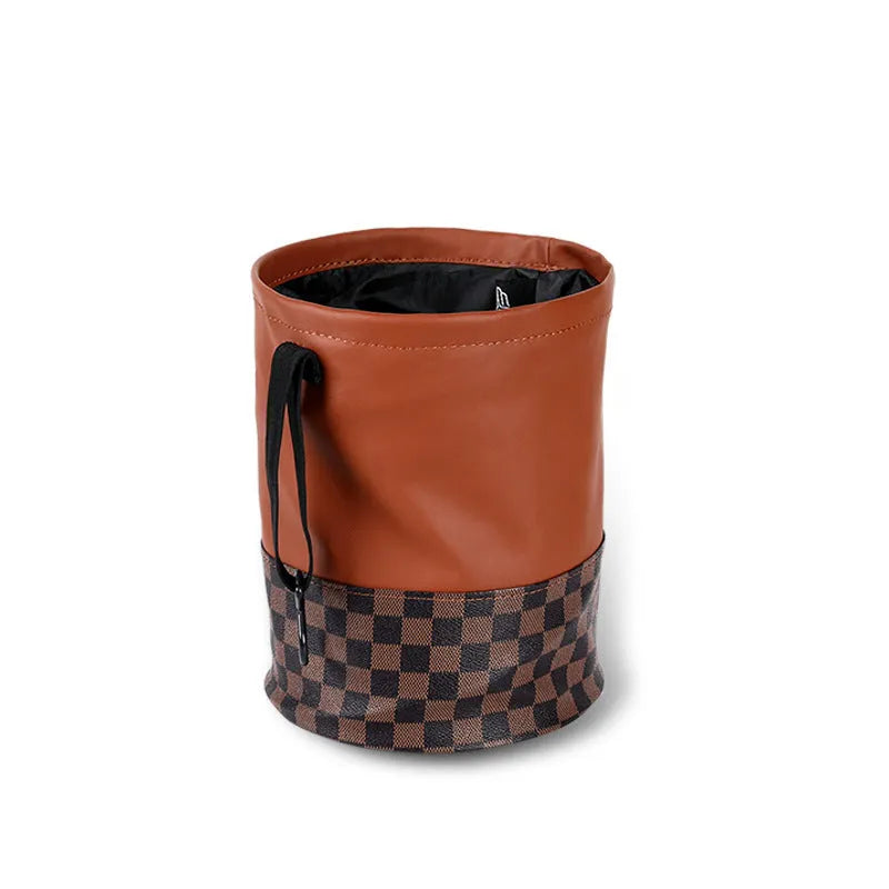 Retractable leather car interior trash can with carry handle in colour as shown.