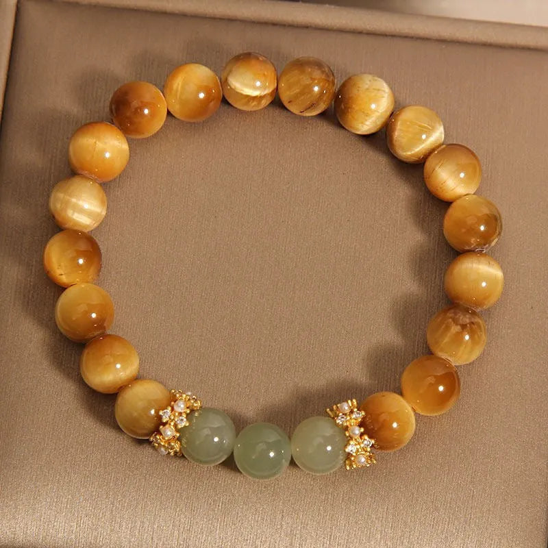 Natural yellow Tiger's Eye Hetian Jade bracelet in U-shape with gold gourd charm.