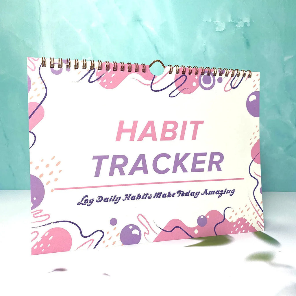 English habit tracking book with 12 pages measuring 21cm by 28cm