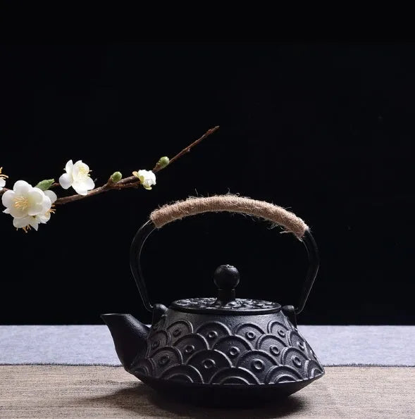 Japanese-style cast iron teapot in a choice of ten patterns, shown in 0.9L size.