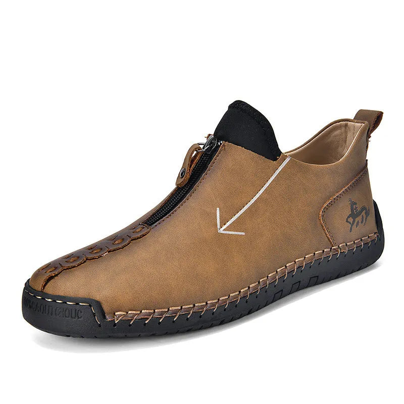 Men's black casual ankle boots with a front zip closure and visible stitching detail