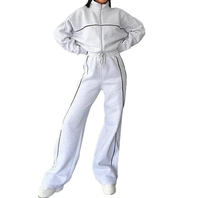 Casual two-piece suit set with a grey hoodie and striped lace-up trousers on a hanger