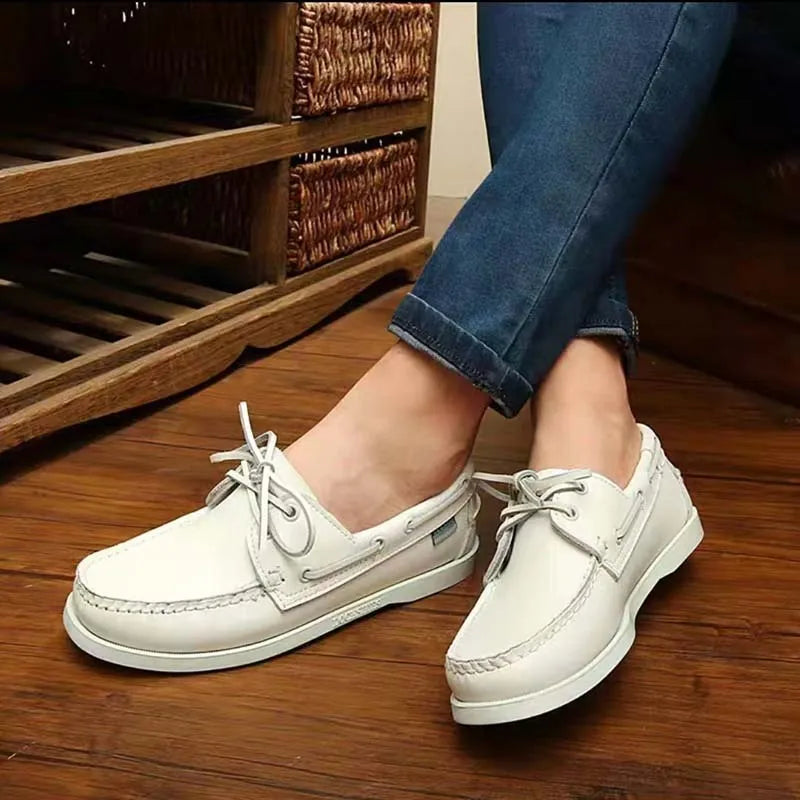 Men's British-style casual shoes with artificial PU uppers in black, white, blue brown, and black and white colour options.