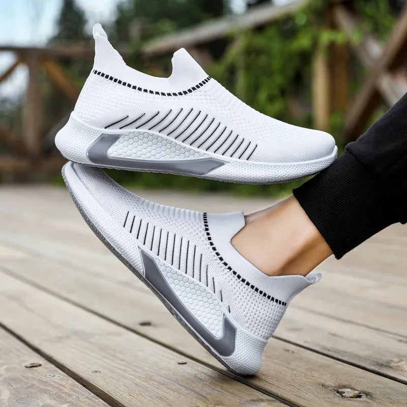 Men's black and white striped mesh sock shoes with lace-up front on a white background