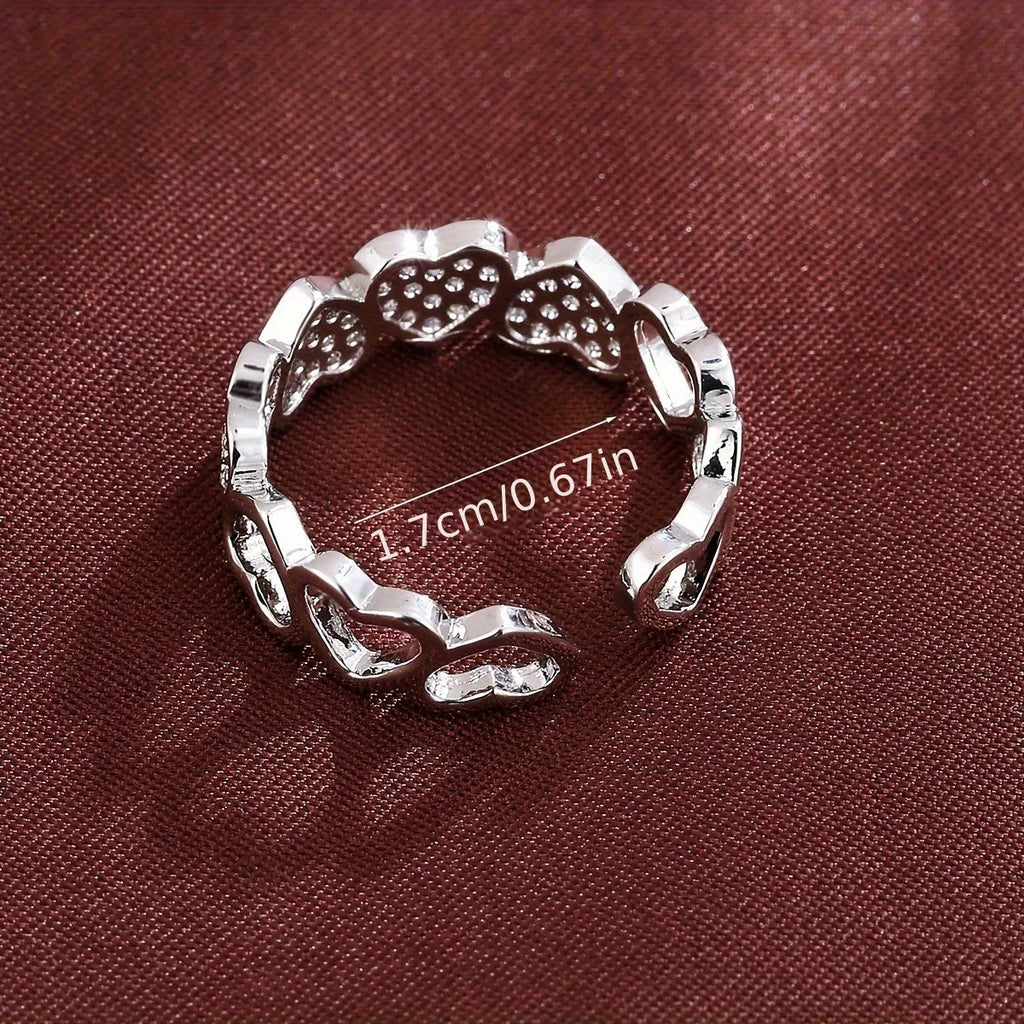 Geometric love heart couples ring with adjustable opening in gold and silver colours