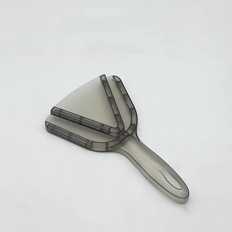 Red adjustable telescopic can opener and bottle opener with non-slip handle on a kitchen counter.