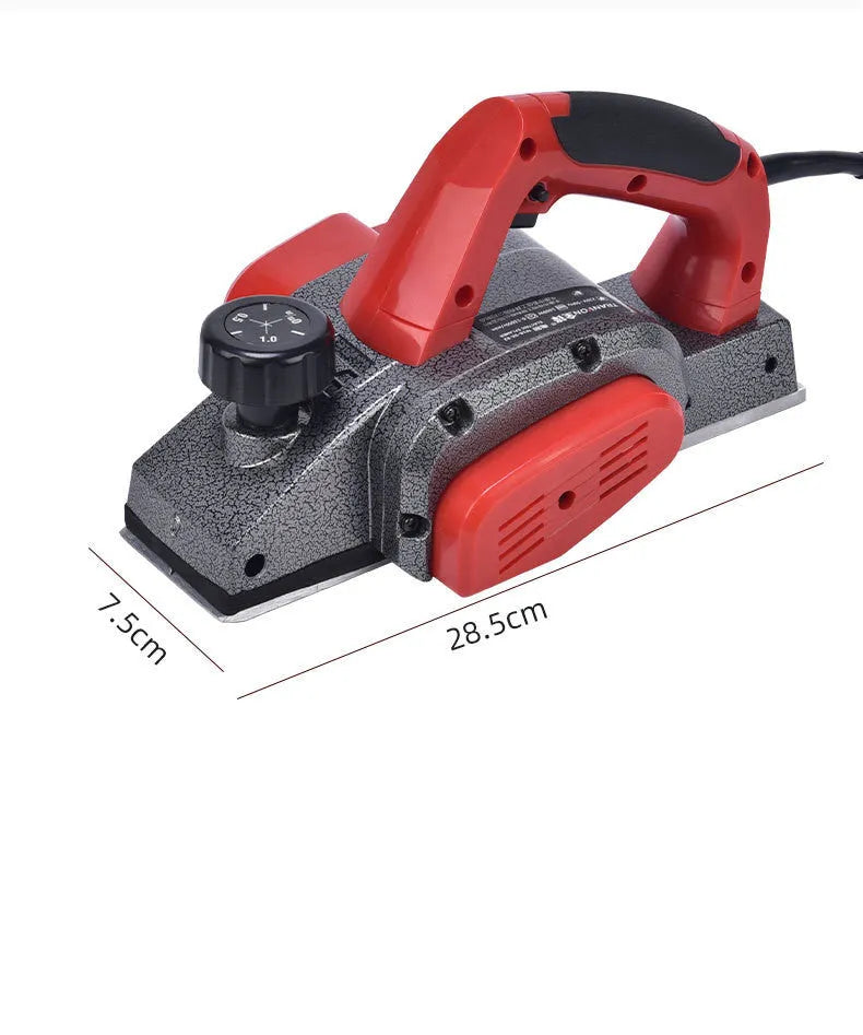 Red electric wood planer tool with aluminium shell showing 82mm cutting width