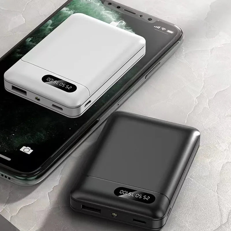 White or black portable power bank with multiple USB ports showing compact 92x63x23mm dimensions