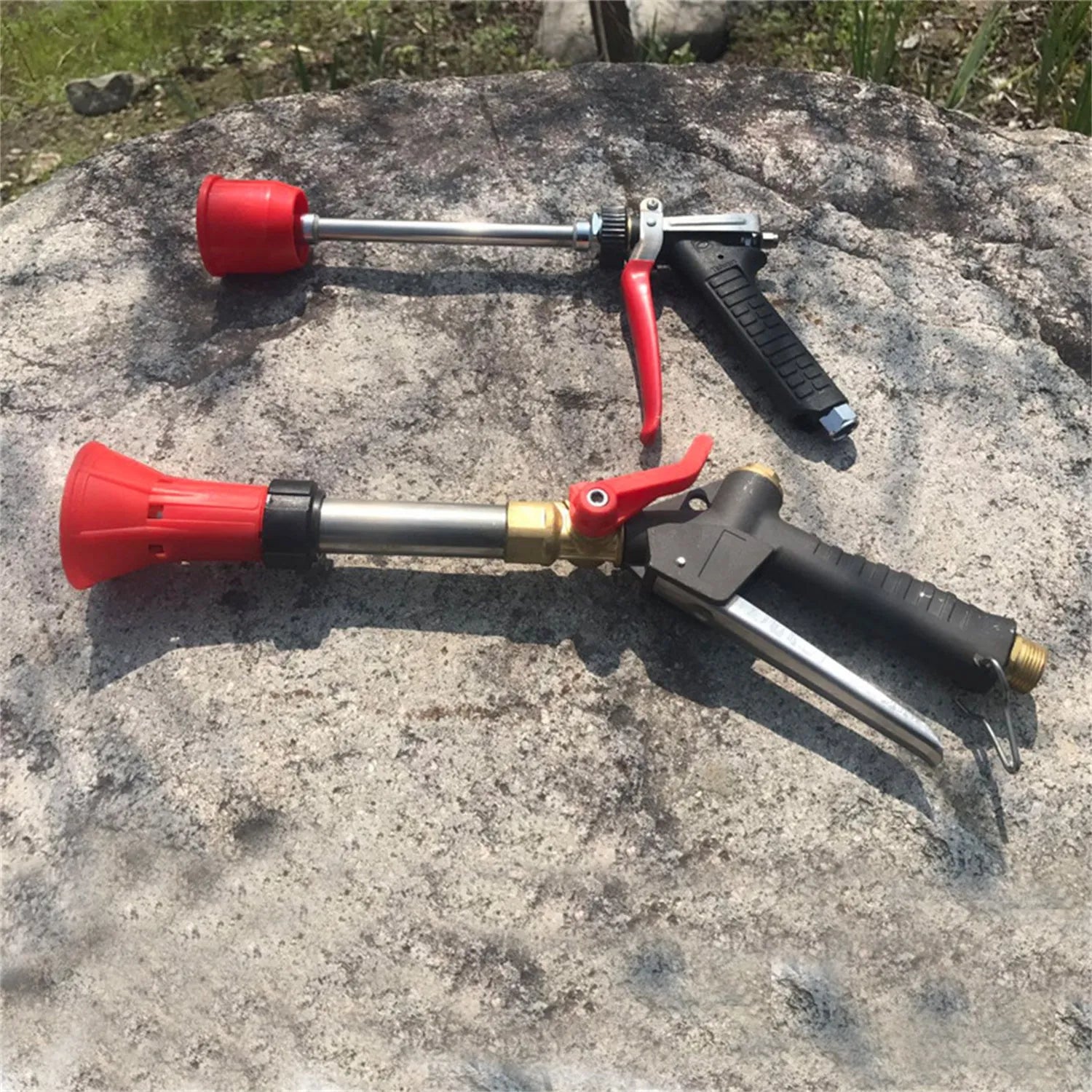 Plastic agricultural spray gun with submachine gun style handle and adjustable pressure control