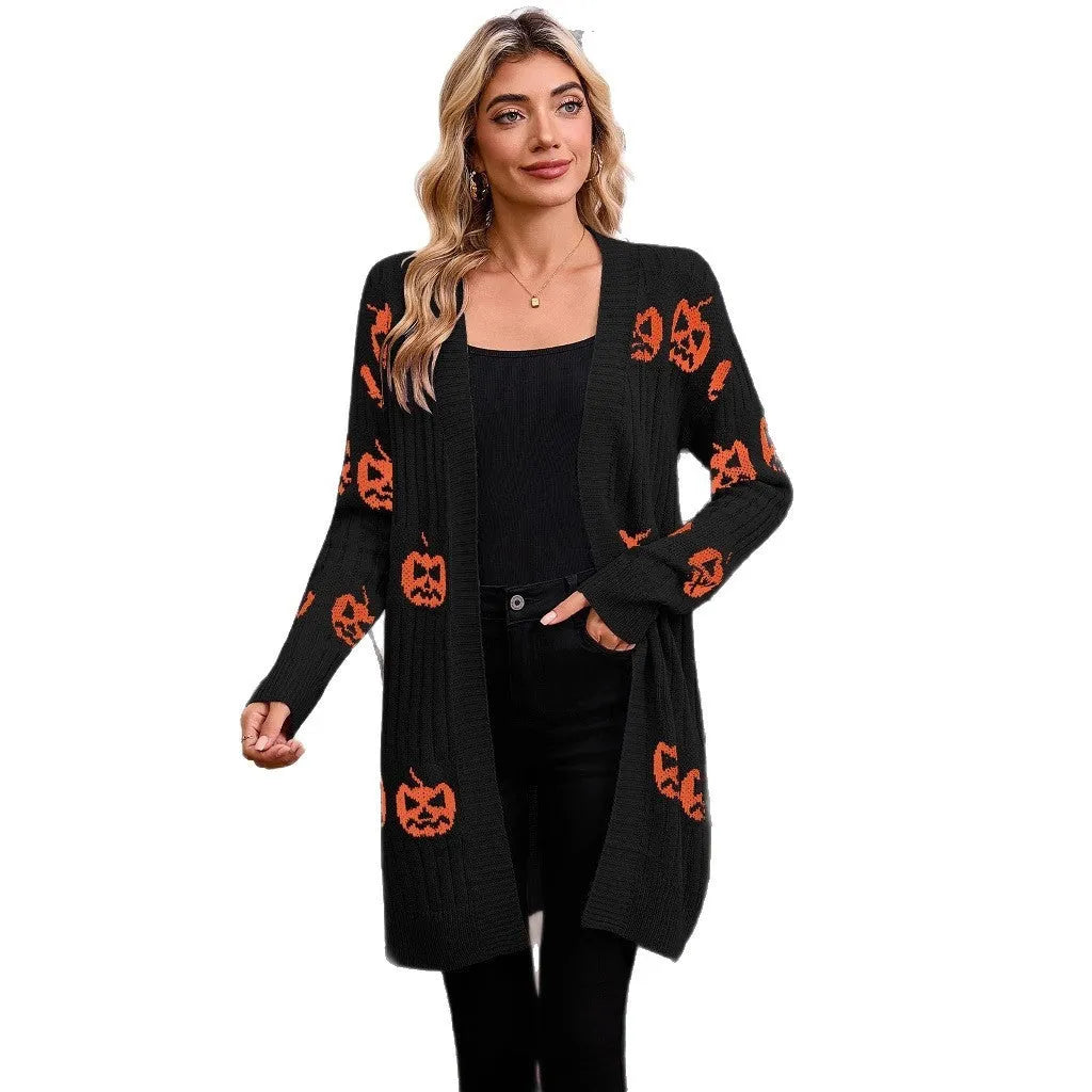 Women's black knitted cardigan with an orange pumpkin head jacquard pattern and regular sleeves.