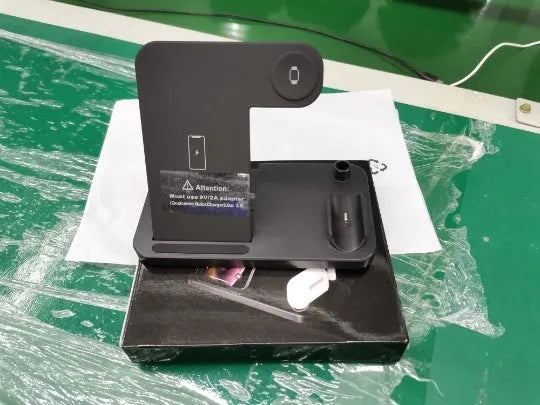 Folding 4-in-1 wireless charging station showing iPhone on vertical stand, Apple Pencil on magnetic spot, and two colour options.