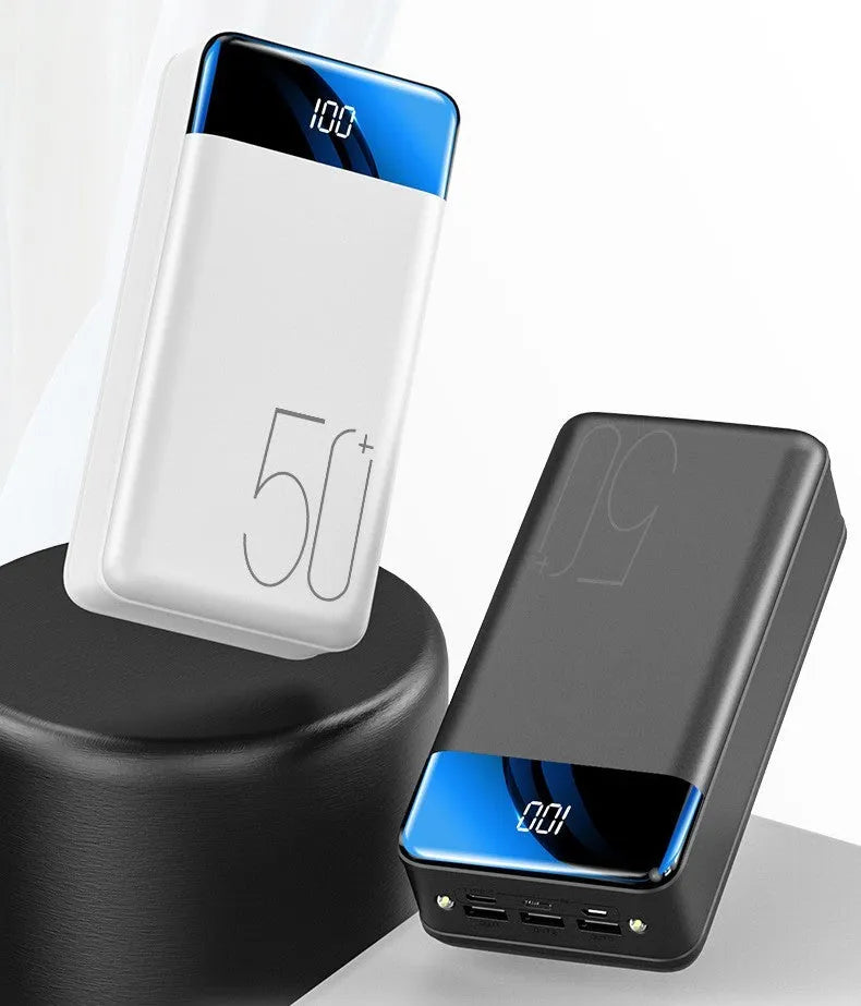 Large black or white 50000mAh power bank with three charging ports showing dimensions 169x83x52mm
