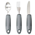Stainless steel adaptive spoon with black rubber anti-shake handle for elderly food aid.