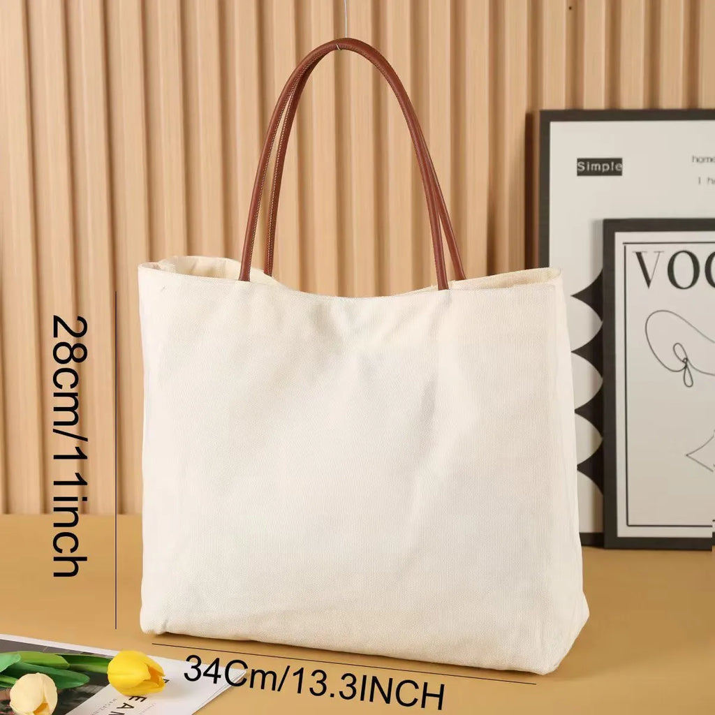 Natural canvas tote bag in beige white and white colour options with reinforced double handles
