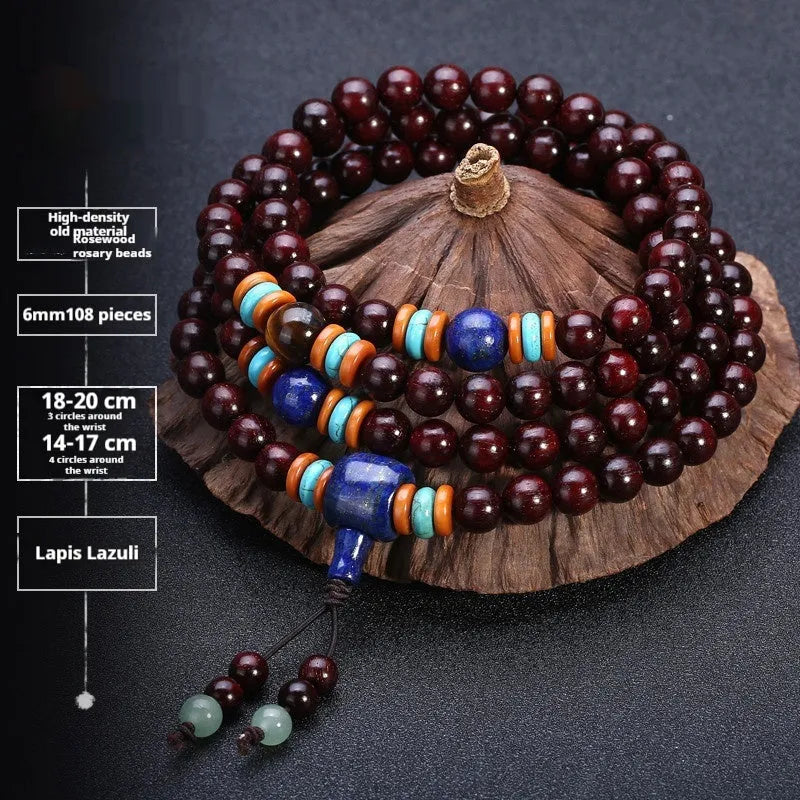 Men's rosewood 108 bead mala bracelet with a turquoise gemstone decorative centrepiece.