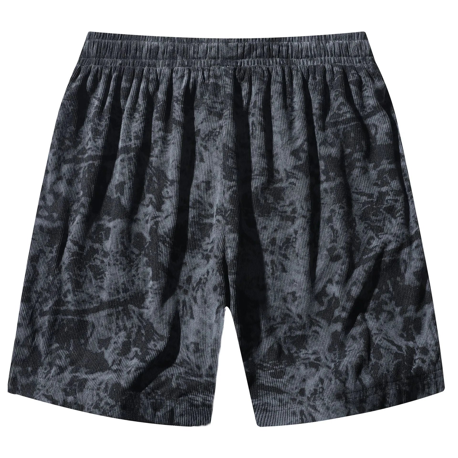 Men's straight-leg corduroy camouflage shorts in black, shown on a model.
