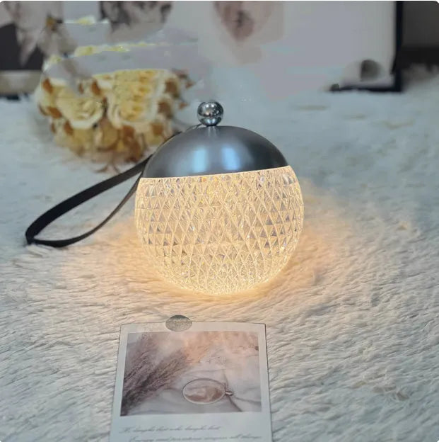 Modern spherical desk lamp in chrome colour with touch dimmable control