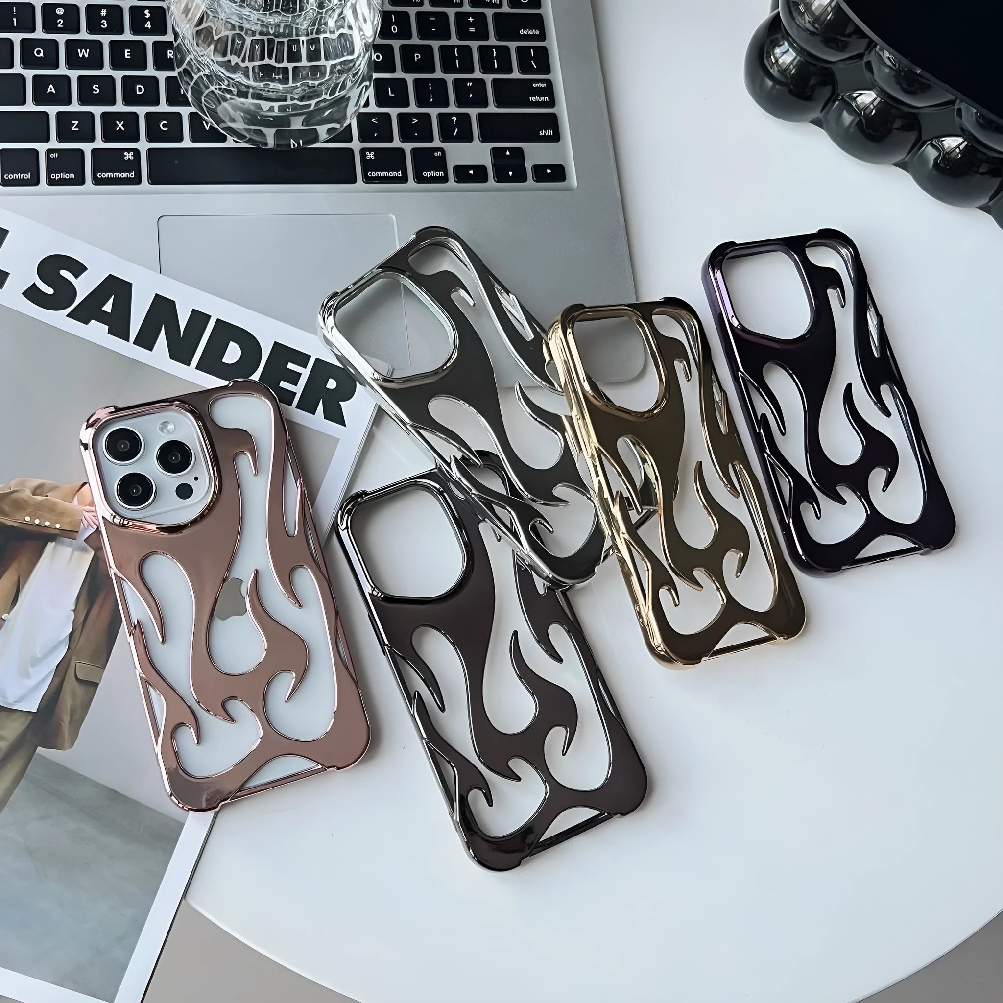 Electroplated hollow flame pattern phone case for Apple iPhone with metallic finish and heat dissipation design