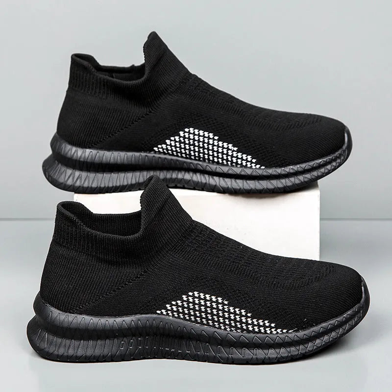 Men's solid colour casual sneakers with fabric upper and low-top design on a white background.