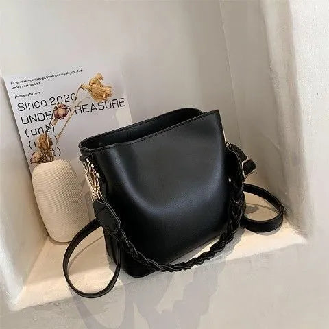 Retro woven PU leather unisex crossbody bucket bag in khaki colour.
