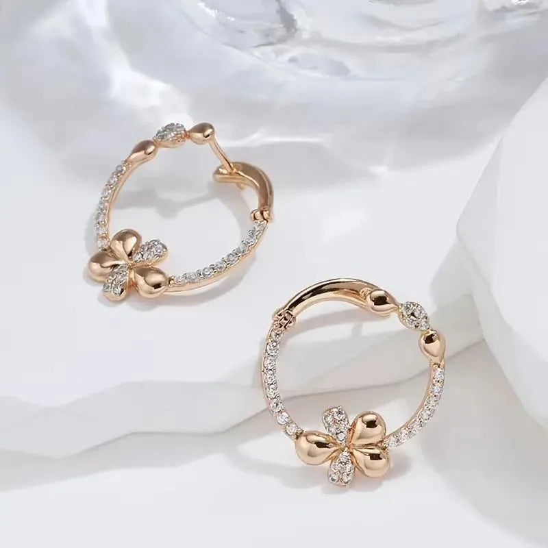 A pair of women's round copper hoop earrings with an electroplated finish in colour EK13286-FD-01.