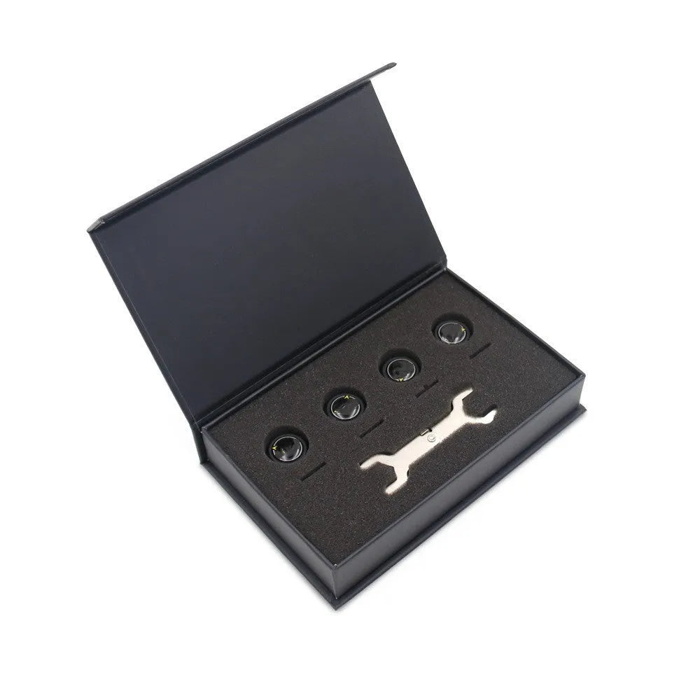 Four black Bluetooth tyre pressure sensors with wrench and anti-theft screws for vehicle installation