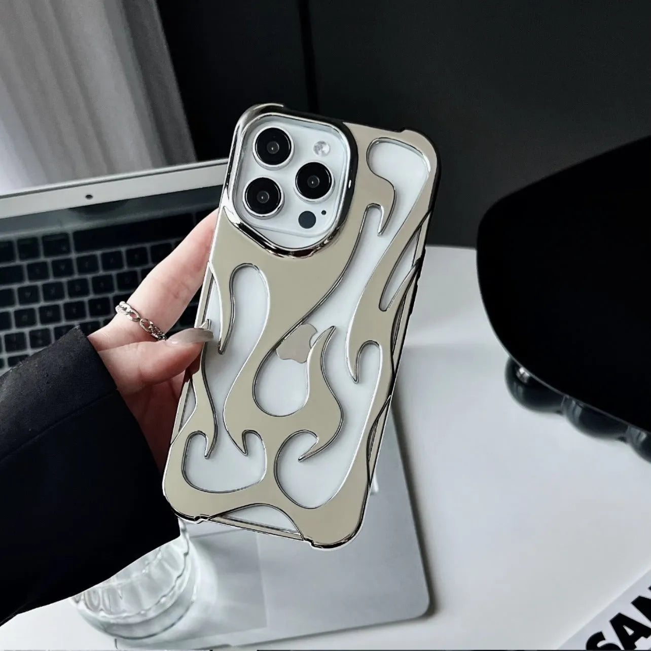 Electroplated hollow flame pattern phone case for Apple iPhone with metallic finish and heat dissipation design