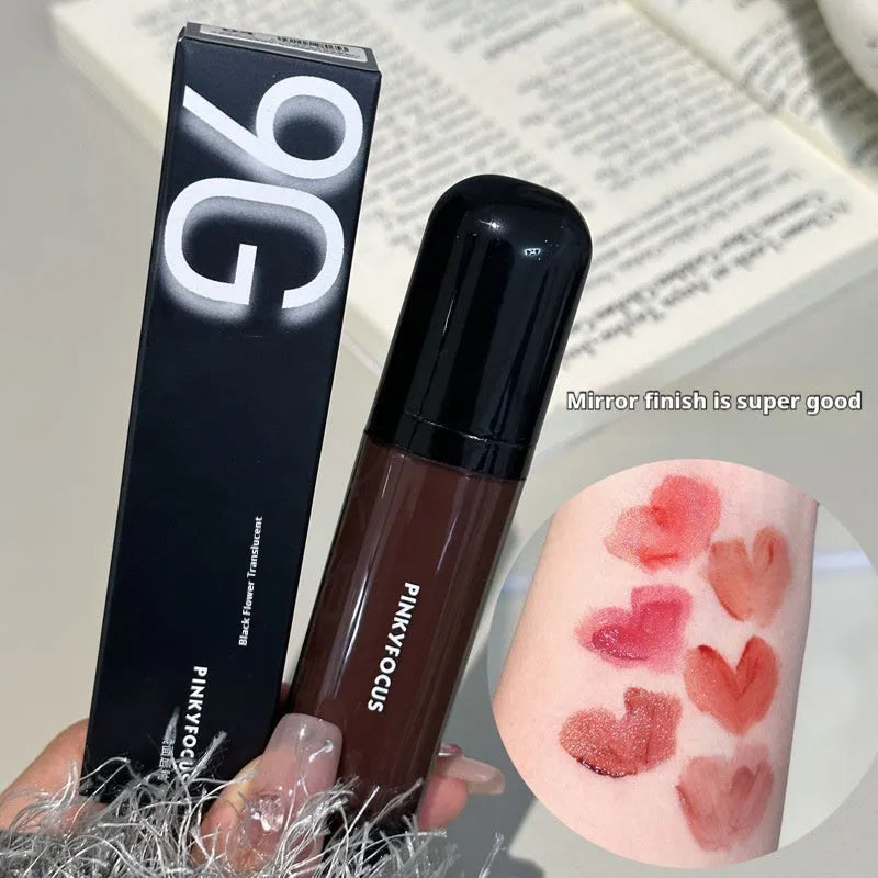 Black shiny mirror lip lacquer cosmetic product showing six colour options including deep reds and browns