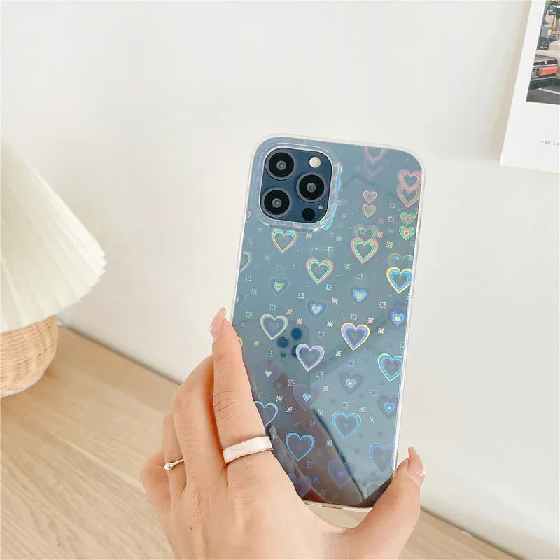 Transparent silicone iPhone case with a colourful laser love heart design.