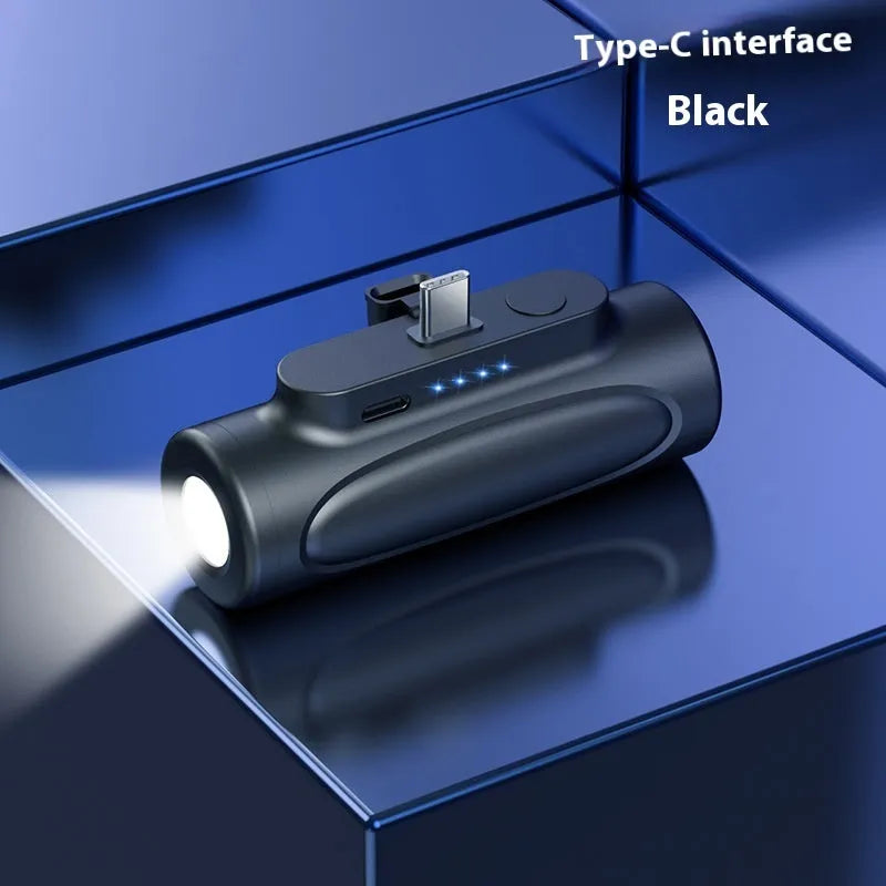Black creative power bank with LED flashlight showing Type-C charging port and compact 83mm size