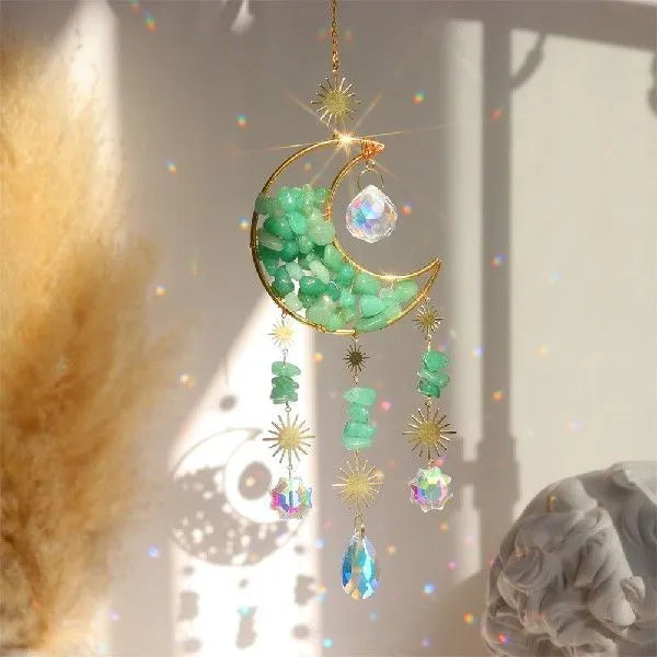 K9 crystal moon pendant on a metal chain for car interior decoration.