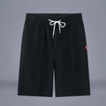 Cotton and linen solid colour cropped pants with drawstring waist in army green.