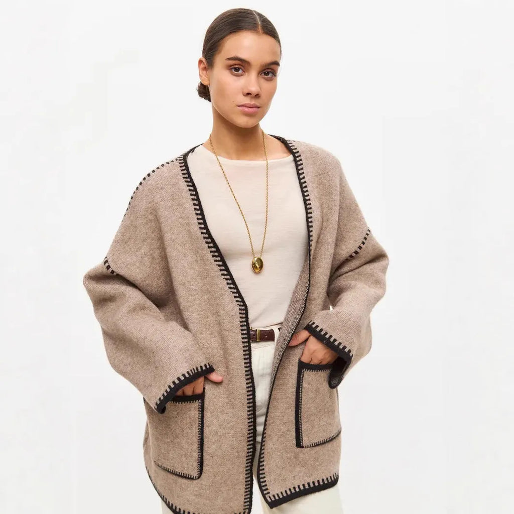 Loose mid-length knitted cardigan with lace-up front closure in cotton imitation cashmere fabric