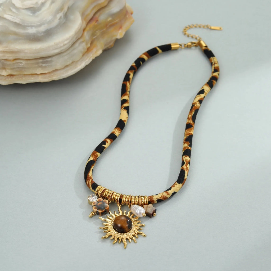 Stainless steel geometric necklace with gold electroplated finish and adjustable chain