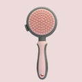 Green and pink 2in1 silicone pet brush showing slicker brush side and octopus-teeth massager side
