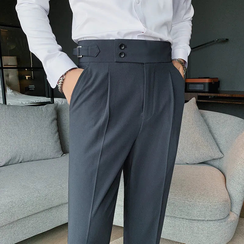 Men's straight leg casual trousers in solid colours including black and grey on a hanger.