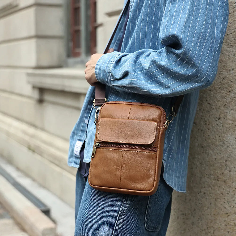 Men's brown leather crossbody shoulder bag with decorative stitching
