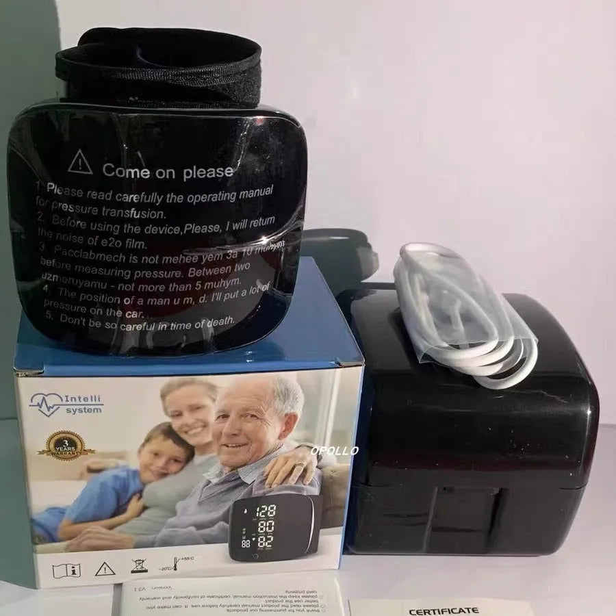 Black wrist blood pressure monitor with USB charging port for home health tracking