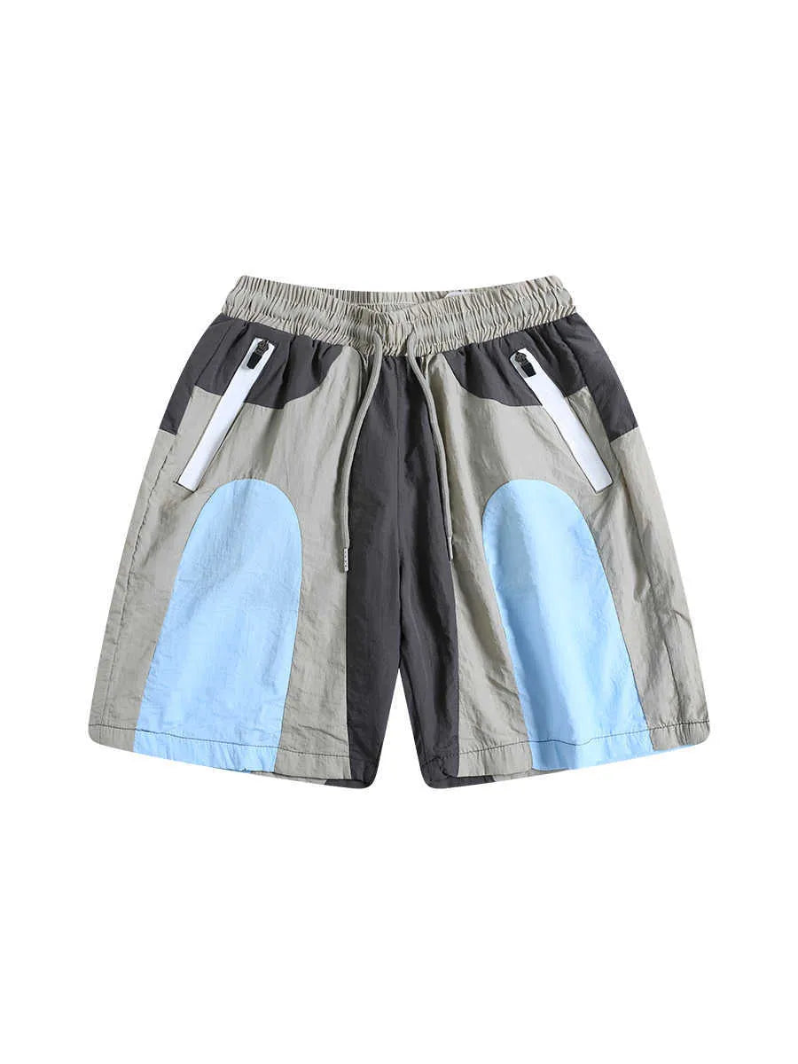 Blue patchwork men's sports shorts with loose straight-leg cut and elastic waist