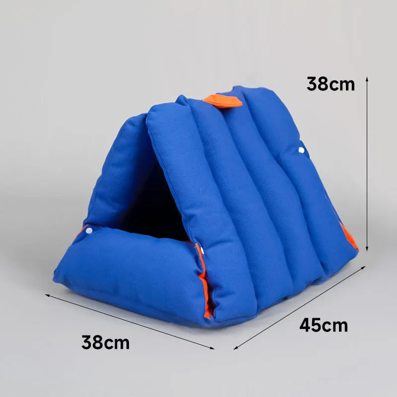 Blue triangular cat bed with drilled holes on the sides for combination, showing removable cotton cover.