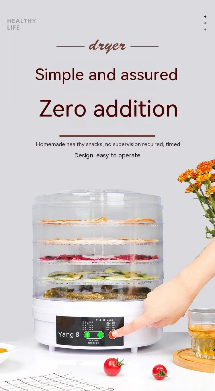 White five-tray food dehydrator with UK plug on kitchen countertop