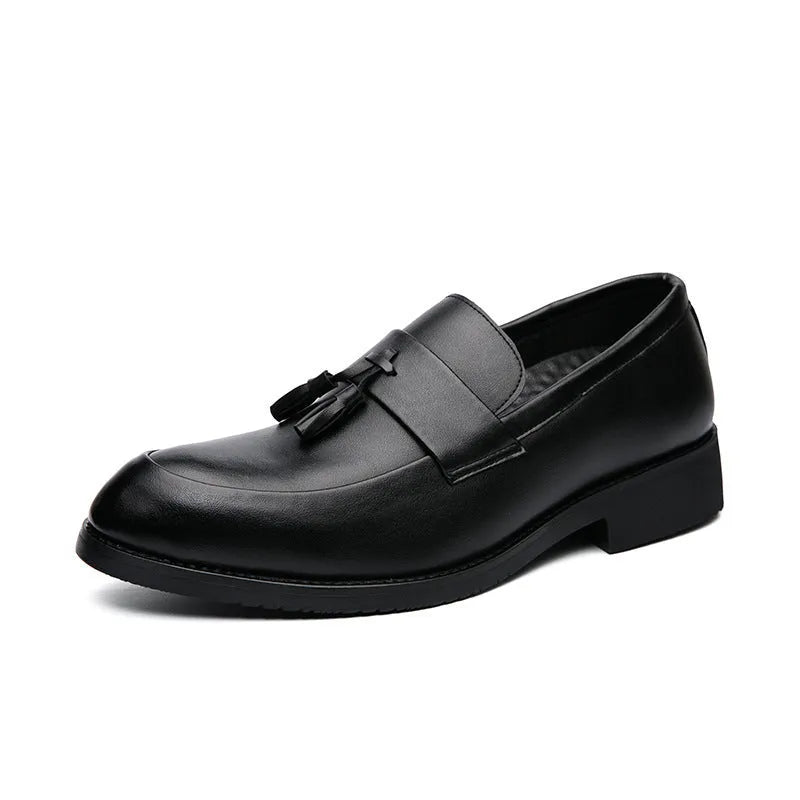 Men's black slip-on business casual shoes with a tassel detail on the artificial PU upper