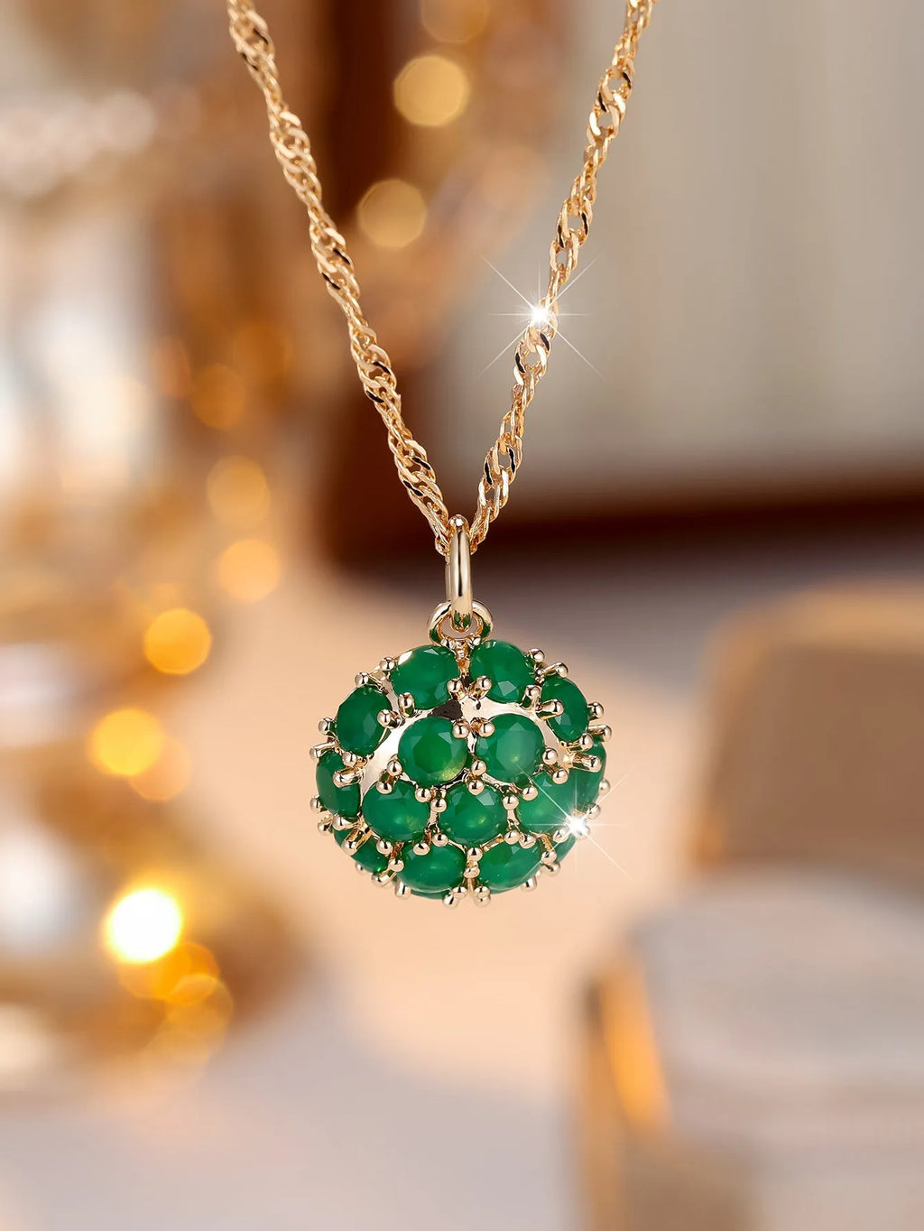 Round emerald and diamond necklace with champagne gold finish and adjustable chain