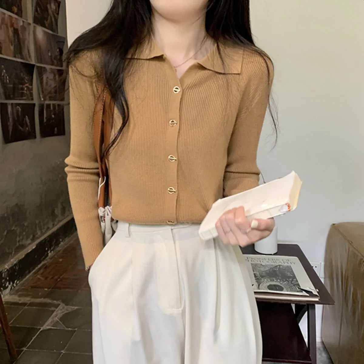 Loose fit beige viscose knitted cardigan with long sleeves, shown worn open.