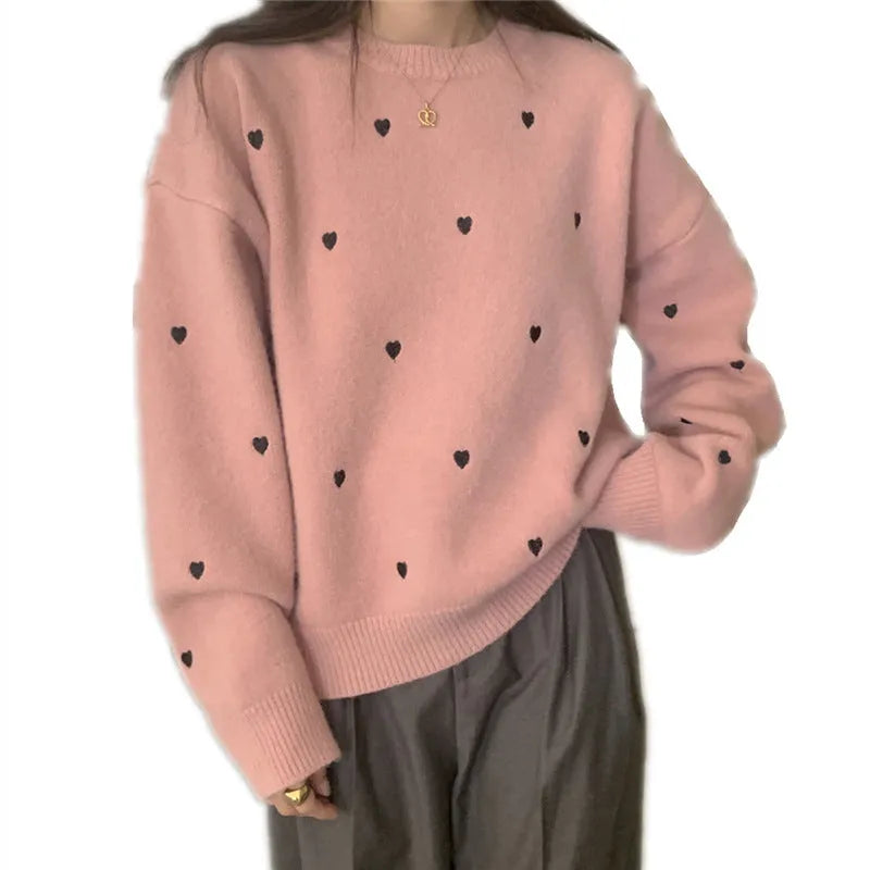 Women's loose fit long sleeve acrylic pullover sweater with love embroidery in milky white.
