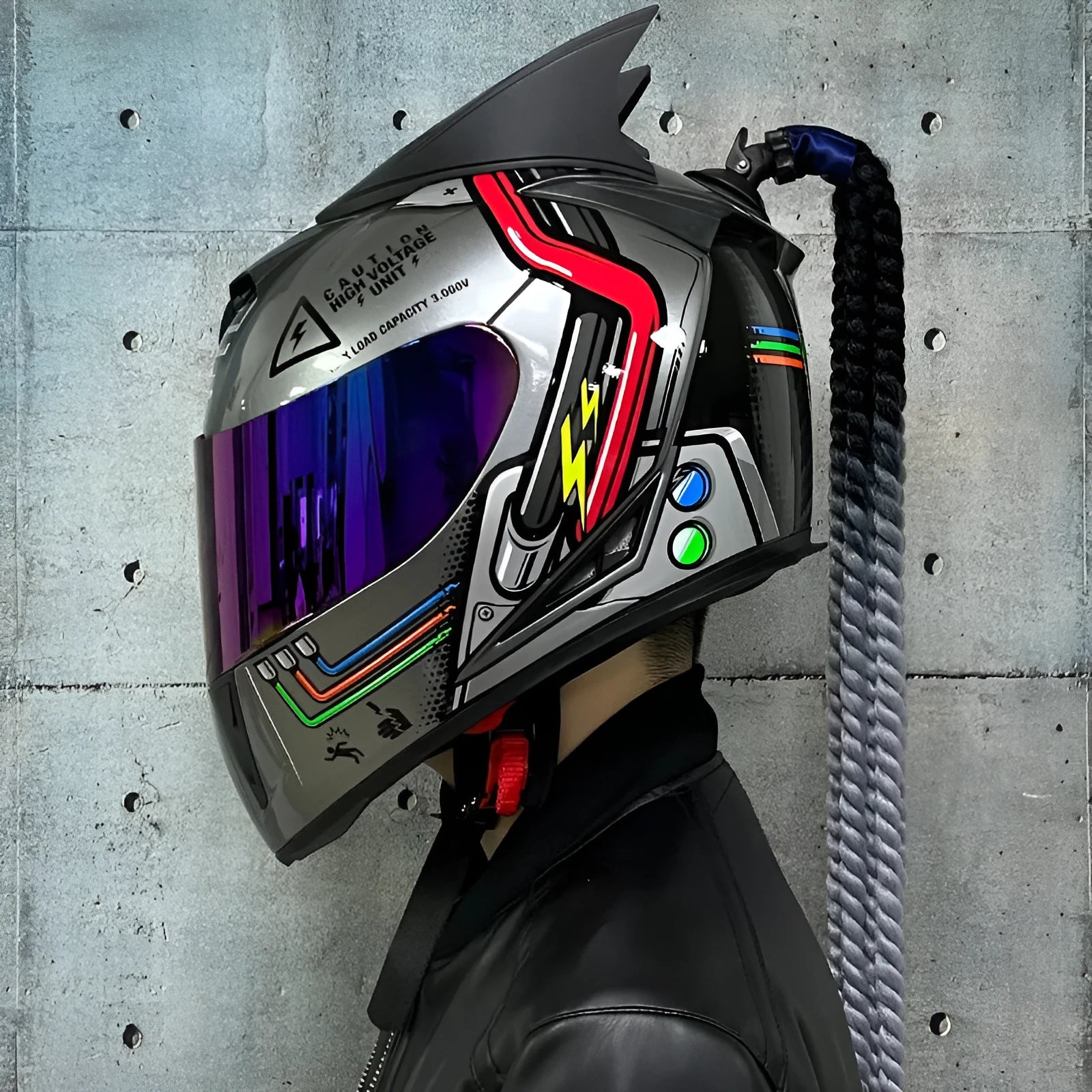 Dirty Braabs couples motorcycle helmets with mirrored visor designs in black clown and blue diamond patterns